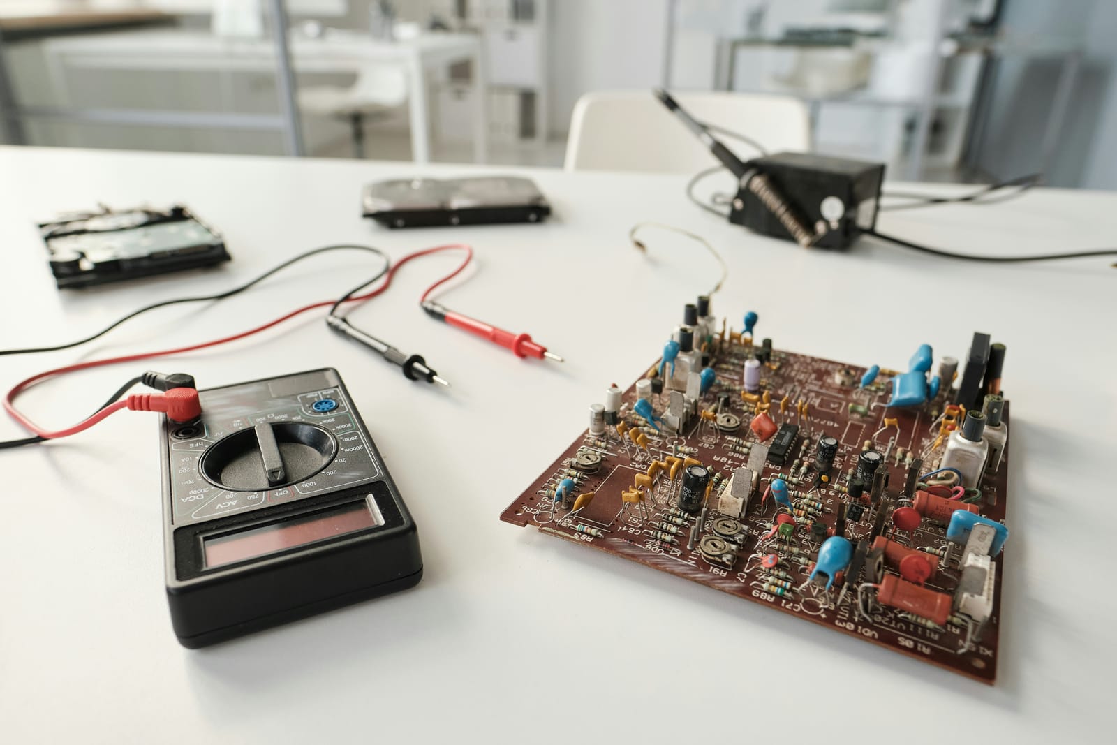 Test bench instruments and probes laid out on a workbench